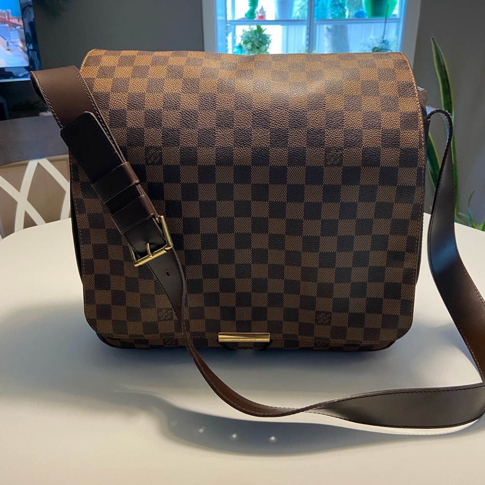 Authentic Louis Vuitton bastille body bag in good condition